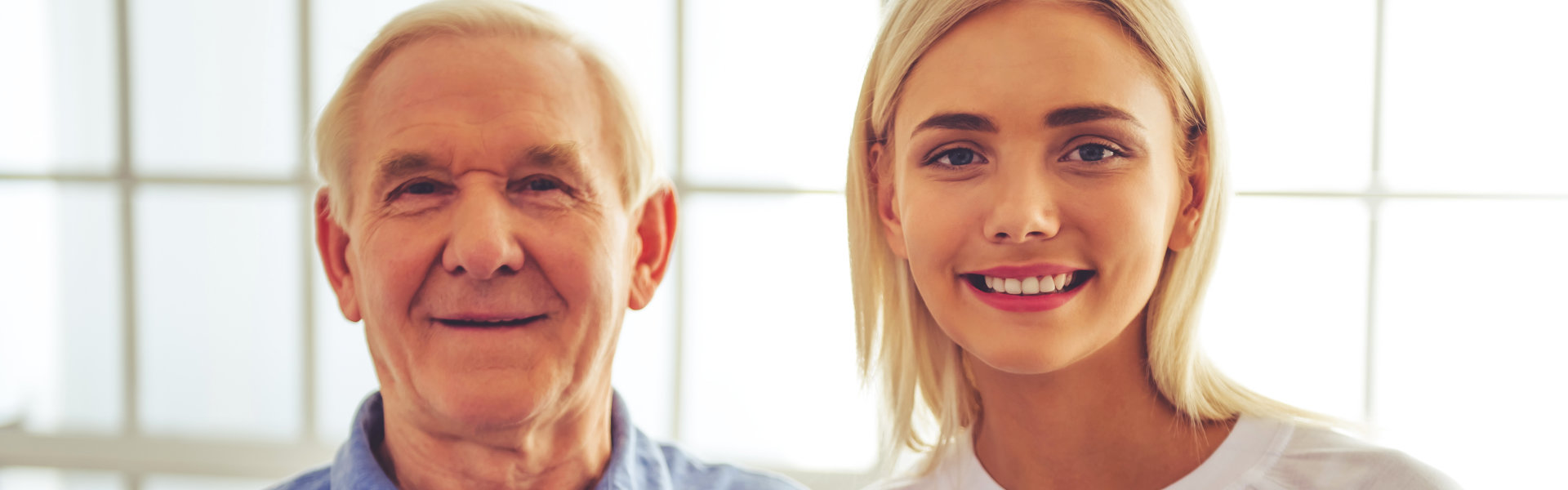 elderly man and woman smiling